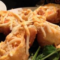 Crab Spring Rolls · Spicy crab mix wrapped with spring rolls and then gently fried, topped with spicy mayo, Jack...