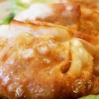 Chicken Dumpling (6) · Steamed or fried served with our special sauce.