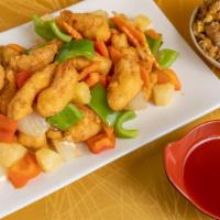 Sweet & Sour · Battered-fried meat in bell peppers, pineapple, yellow onion & carrot. Sauce on side.