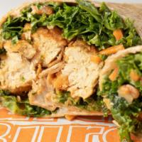 Buffalo Chik-N® Wrap · House made CHIK-N® tenders tossed in buffalo sauce, covered in poblano ranch, and topped wit...