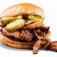 The Manhandler Sandwich · Choice of Texas Beef Brisket or Georgia Chopped Pork piled high with Hot Link Sausage and to...