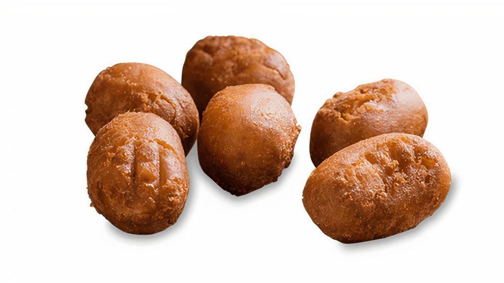 Kids' Mini Corn Dogs · Mini hot dogs wrapped in a honey batter, then fried. Served with choice of one side, or celery, plus OREO Cookies and a fountain beverage or milk.