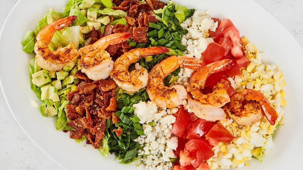 Cobb Salad · Brown sugar bacon, tomato, bleu cheese, hard boiled egg, avocado, green onion, and Romaine with your choice of dressing. We recommend the white balsamic vinaigrette