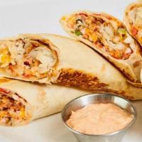 Serafin'S Fish Tacos · Fried tilapia, tangy cabbage, pico de gallo, shredded cheese & ranchero sauce, rolled & gril...