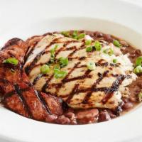 Andouille Chicken · Served over red beans & rice