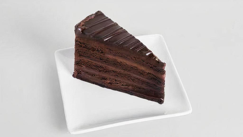 Omg! Chocolate Cake (Slice) · Moist, dark chocolate cake layered with chocolate mousse and covered in rich chocolate ganache. OMG!