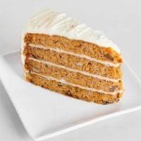 Classic Carrot Cake (Slice) · Layers of incredibly moist carrot cake studded with raisins, walnuts, and pineapple, topped ...