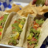 Carnitas Tacos · Fresh Pineapple Pico · House-made Salsa Verde. 3 tacos of the same style with a side of chip...