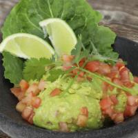 Large Guacamole Salad · Made with fresh avocados, tomatoes, onions and fresh squeezed lime