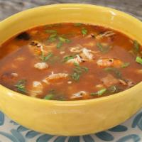 Spicy Shrimp & Rice Stew · Grilled shrimp, Mexican rice with jalapeno sausage in a red chile broth topped and jack chee...