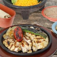 1/2 Lb Chicken · Lime pepper marinated grilled chicken fajitas. Served with your choice of tortillas.