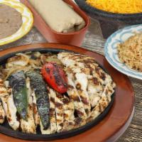 1 Lb Chicken · Lime pepper marinated grilled chicken fajitas. Served with your choice of tortillas.