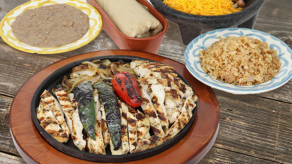 1 Lb Chicken · Lime pepper marinated grilled chicken fajitas. Served with your choice of tortillas.
