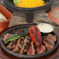 1/2 Lb Filet Mignon · Sizzling 8 oz choice beef tenderloin. Served with  your choice of tortillas.