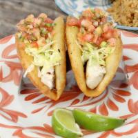 Fish Or Shrimp Tacos · Grilled 8 oz. mahi mahi fillet tacos with creamy poblano sauce, crisp iceberg lettuce and pi...