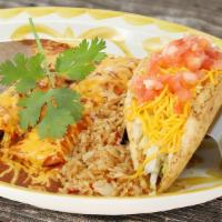 The Sr Gaffigan · Braised beef enchilada ancho, cheese enchilada ancho, puffy ground beef taco