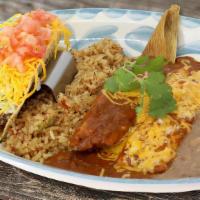 The Nico · Cheese enchilada, tamale with ancho sauce,  beef taco with rice and frijoles