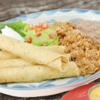 Chicken Flautas · 4 Corn tortillas filled with roasted chicken & cheese, guacamole, sour cream, & chile con qu...