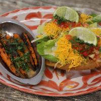 Vegetarian Puffy Tacos · Our homemade corn tortillas lightly fried & filled with Romaine lettuce hearts, guacamole, s...