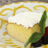 Tres Leches · Vanilla cake in three milks & topped with whipped cream and seasonal berries