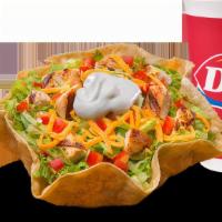 Taco Salad Chicken Combo · Crispy tortilla bowl filled with sliced grilled chicken breast, shredded cheddar cheese, cri...