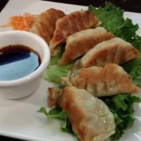 Potsticker · Seared chicken and vegetable dumplings, in pepper soy dipping sauce.