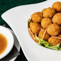 Hush Puppies & Honey · Fried Hushpuppies served with Honey Butter