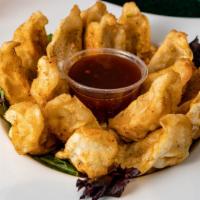 Potstickers · Fried Postickers with chicken served with Thai Chili Sauce