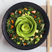 Asian Kale Salad · A delicious fresh salad! Massaged kale tossed with avocado, carrots, mac nuts, white and gre...