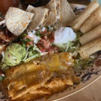 La Fiesta Platter · Tamales, flautas, cheese stuffed jalapeños, beef quesadilla, served with grilled chipotle on...