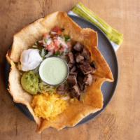 Taco Salad · Shredded lettuce, grilled chicken fajita or carne molida, tortilla chips, pico de gallo, gua...