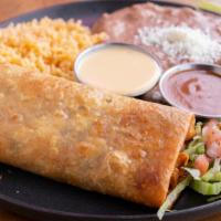 Chimichangas · A flour tortilla stuffed with refried beans, cheese and your choice of beef or chicken, then...