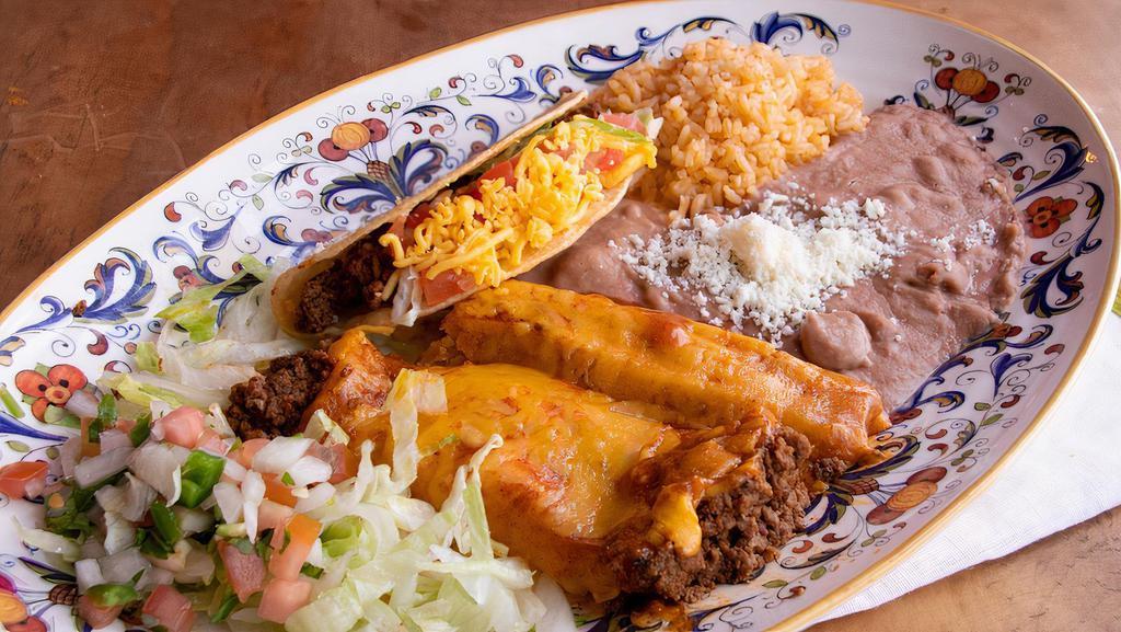 El Primo · Red ground beef enchilada, pork tamale, crispy taco.