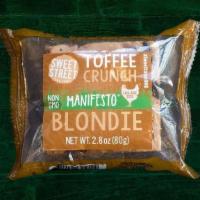 Toffee Crunch Blondie · A caramelized, dense and chewy butterscotch brownie stuffed with milk and semi-sweet chocola...