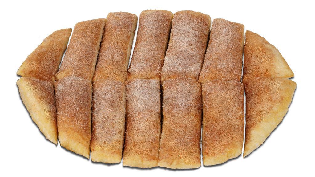 Cinnamon Sticks · Mr Gatti's Fresh Dough, served Piping Hot, Smothered with our Signature Sweet Butter, and topped with our secret Blend of Cinnamon Sugar.  Take it over the top with our Delicious Icing on top.
