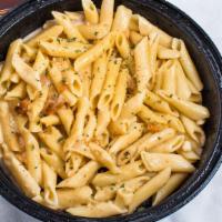 Pasta Alfredo · Penne pasta tossed in our homemade spicy Alfredo sauce. Topped with sautéed onions, garlic a...