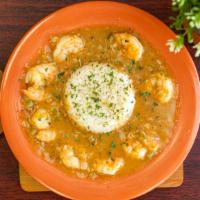 Shrimp Etouffee · Savory combination of grilled shrimp in a rich brown roux consisting of fresh onions and bel...