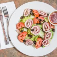 Antipasto · Lettuce, tomato, black olives, salami, ham, and mozzarella.