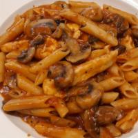 Chicken Arabiata · Sliced chicken sautéed with garlic and mushrooms in a fiery white wine marinara sauce with p...