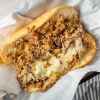 Cheesesteak Sandwich · Steak, onions, provolone, jc's seasoning, croissant.