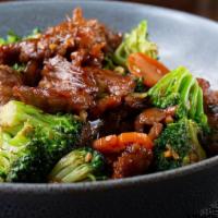 Broccoli Beef Bowl  · A popular dish of stir-fried beef and broccoli, served with a side of white rice.