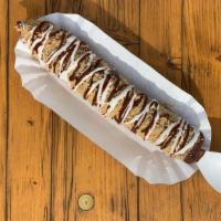 S'More Banana · A frozen banana, dipped in melted chocolate, rolled in graham crackers, drizzled with marshm...