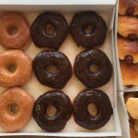 Hope Pk💛 · One dozen Sausage rolls
6 Glazed and 6 Chocolate donuts
One dozen Glazed donut holes