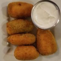 Jalapeno Popper With Jalapeno Ranch Dinner · Jalapeno halves stuffed with mild Cheddar cheese, then breaded and fried served with ranch d...