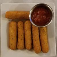 Mozzarella Sticks With Marinara Sauce Dinner · Mozzarella cheese sticks fried with seasoned breadcrumbs and served with marinara sauce on t...