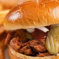 Smoke Bbq Pork Sandwich · Pulled smoked pork in tangy BBQ topped with onions and pickles