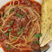 Spaghetti Bolognese Dinner · Homemade meat sauce and tossed in a bed of spaghetti pasta.