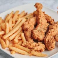 Chicken Tenders · Perfectly seasoned chicken tenders breaded for a crunchy bite served with a side of your cho...