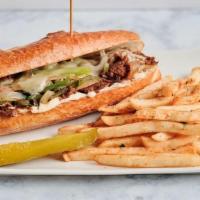Korean Pepperjack Cheesesteak · Our version of a Philly cheesesteak with a twist. Thinly sliced bulgogi marinated in our spe...