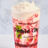 Strawberry Avalanche · White chocolate shake rimmed with strawberry syrup.